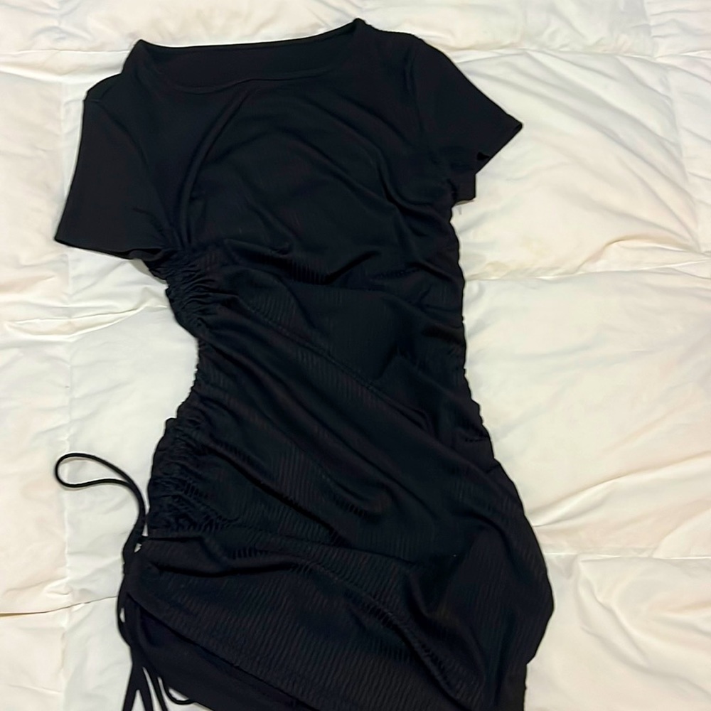 Black Brandy Melville dress. Size small-medium. Adjustable drawstrings on side